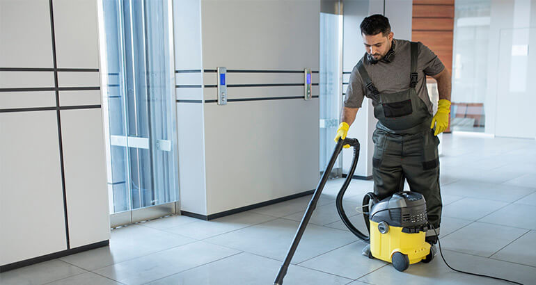 Technician cleaning appliance components in Harare 